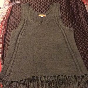 Cute sweater top with fringe on the bottom